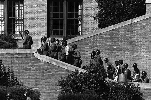 Soldiers from 101st Airborne escort Little Rock Nine students into Central High School
