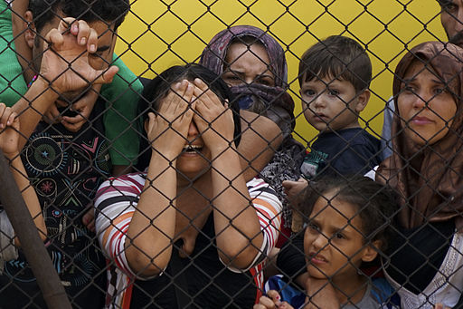 Women_and_children_among_Syrian_refugees_striking_at_the_platform_of_Budapest_Keleti_railway_station._Refugee_crisis._Budapest,_Hungary,_Central_Europe,_4_September_2015._(3)